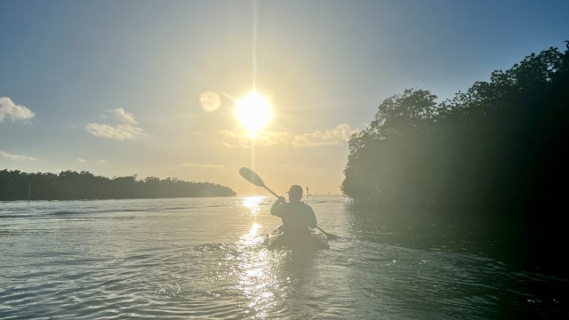 A sunset paddle, making our way back to the boat.