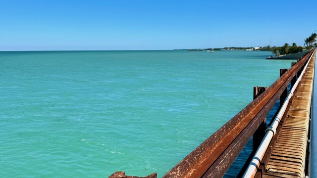 I love the contrast of the rust and the turquoise blue of the water